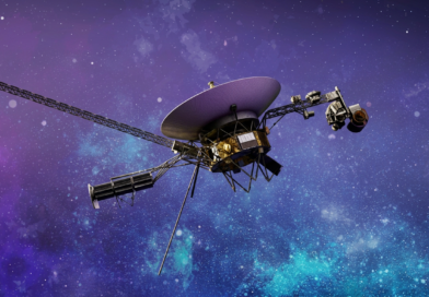Voyager 1 spacecraft traveling in deep interstellar space with galaxy background NASA Voyager 1