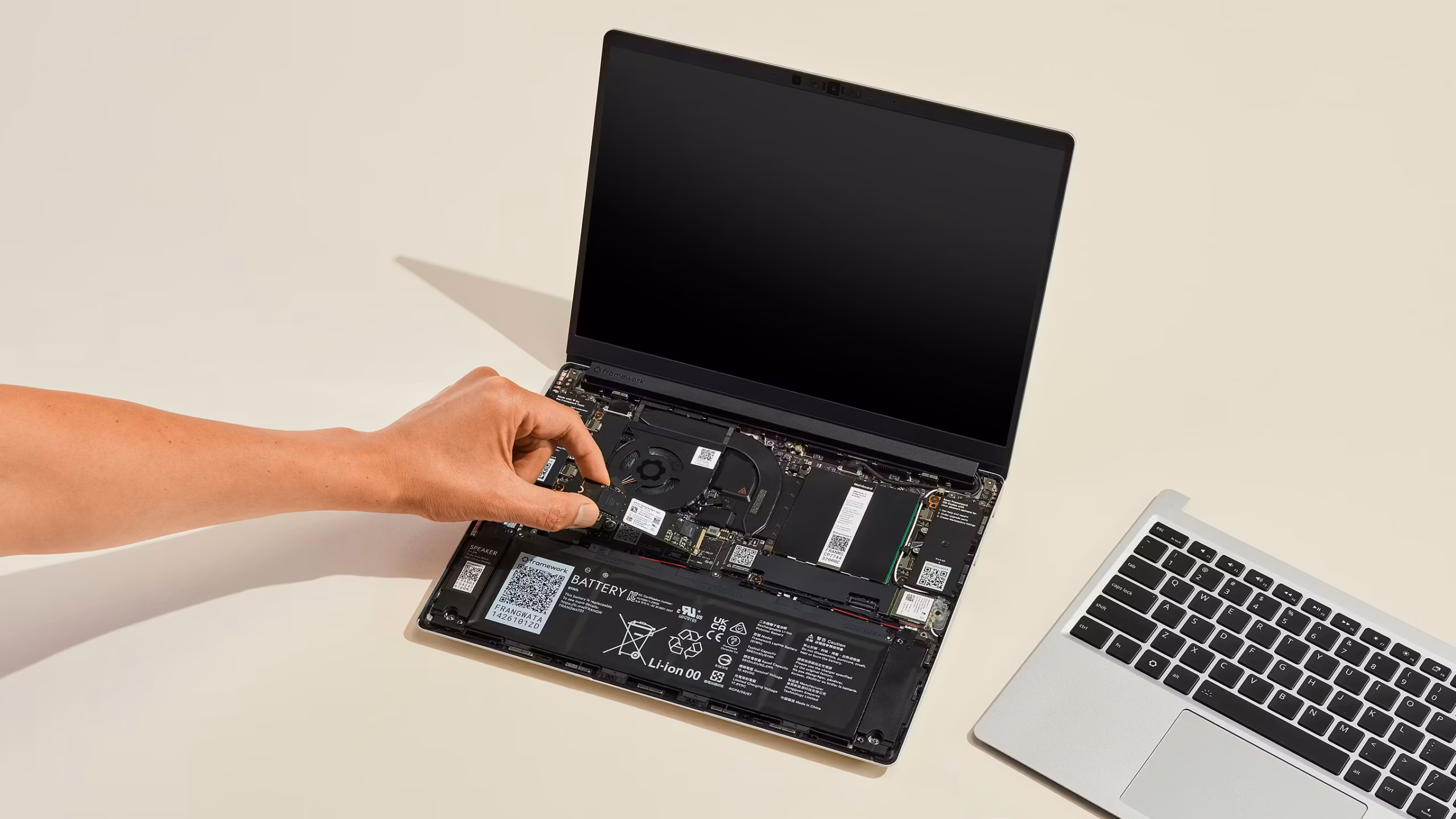 Framework Laptop 13 Pro modular internal components with upgradeable RAM, SSD, and battery