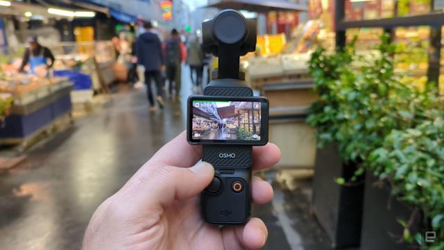 DJI Osmo Pocket handheld vlogging camera market shooting